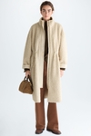 Double-faced faux-shearling long coat