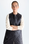 Technical trench coat with hood and quilted gilet