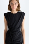 Shoulder-padded draped crepe fitted top