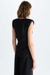 Shoulder-padded draped crepe fitted top